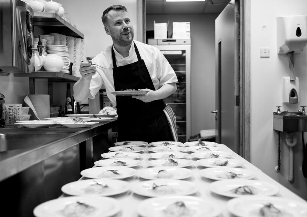 Chris serving food