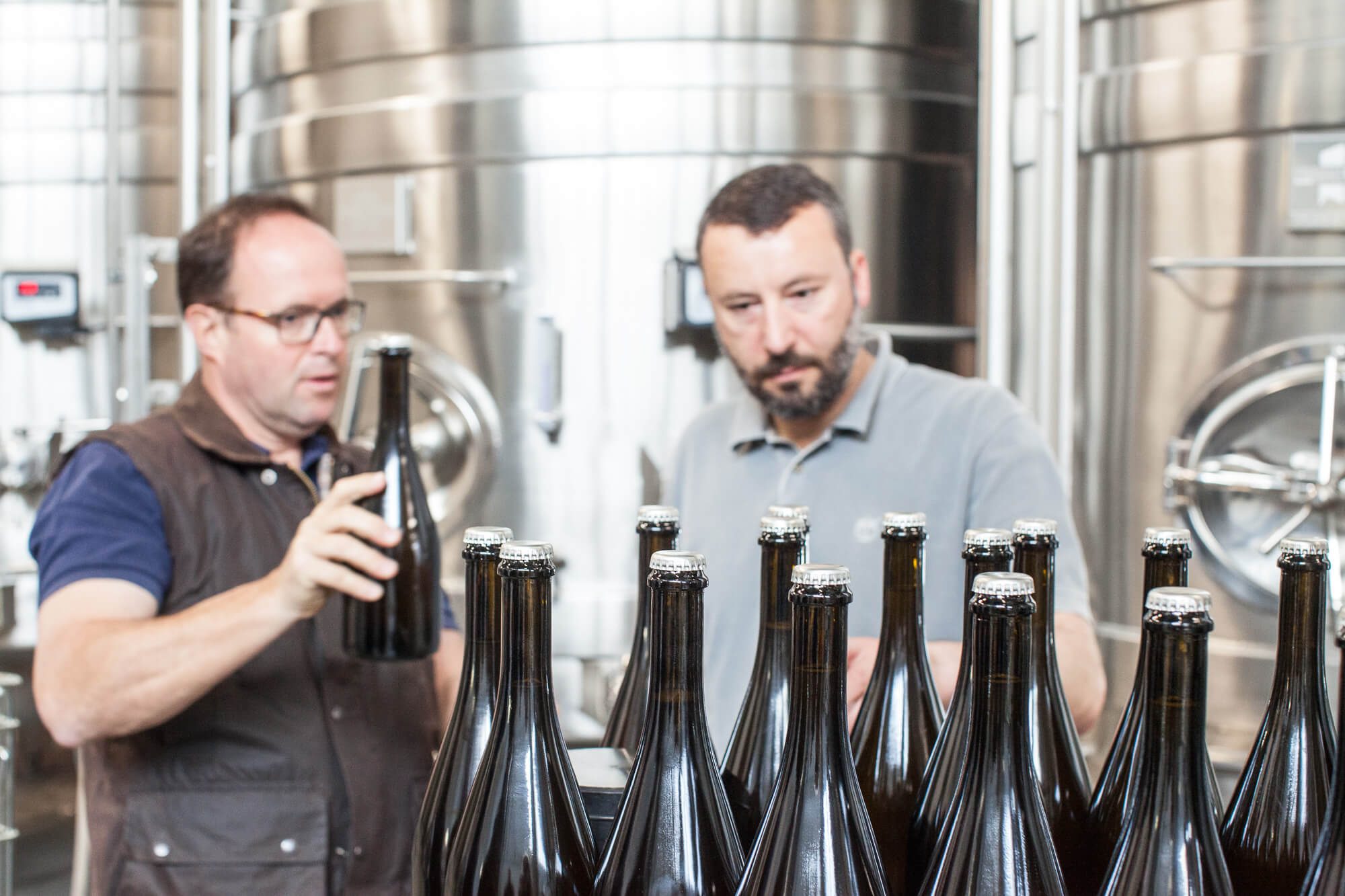 Mark and Jonathan Bottling vintage wine