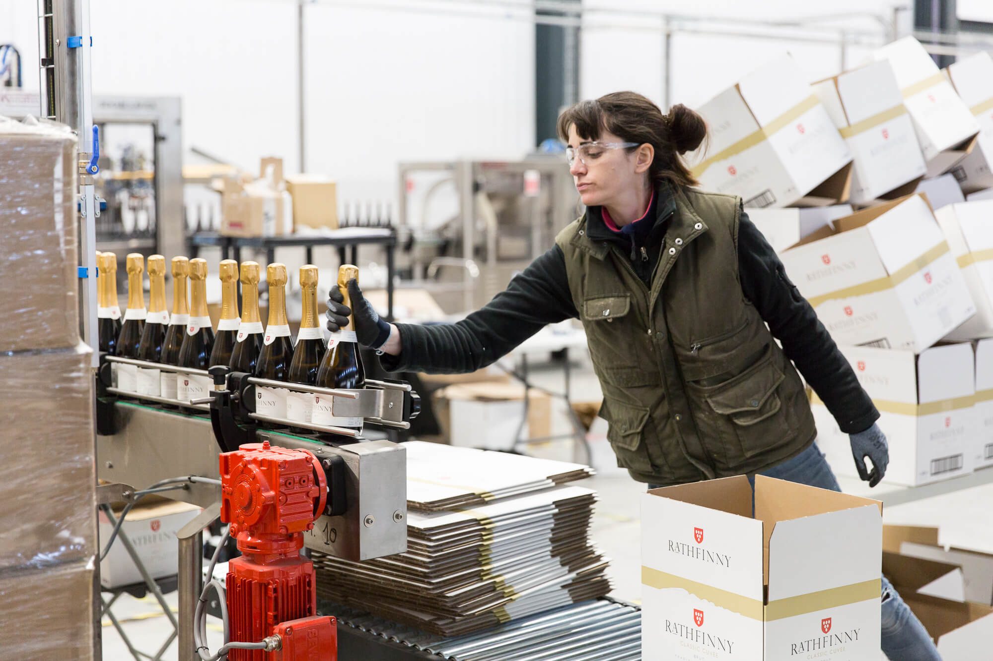 Hannah packing wine bottles